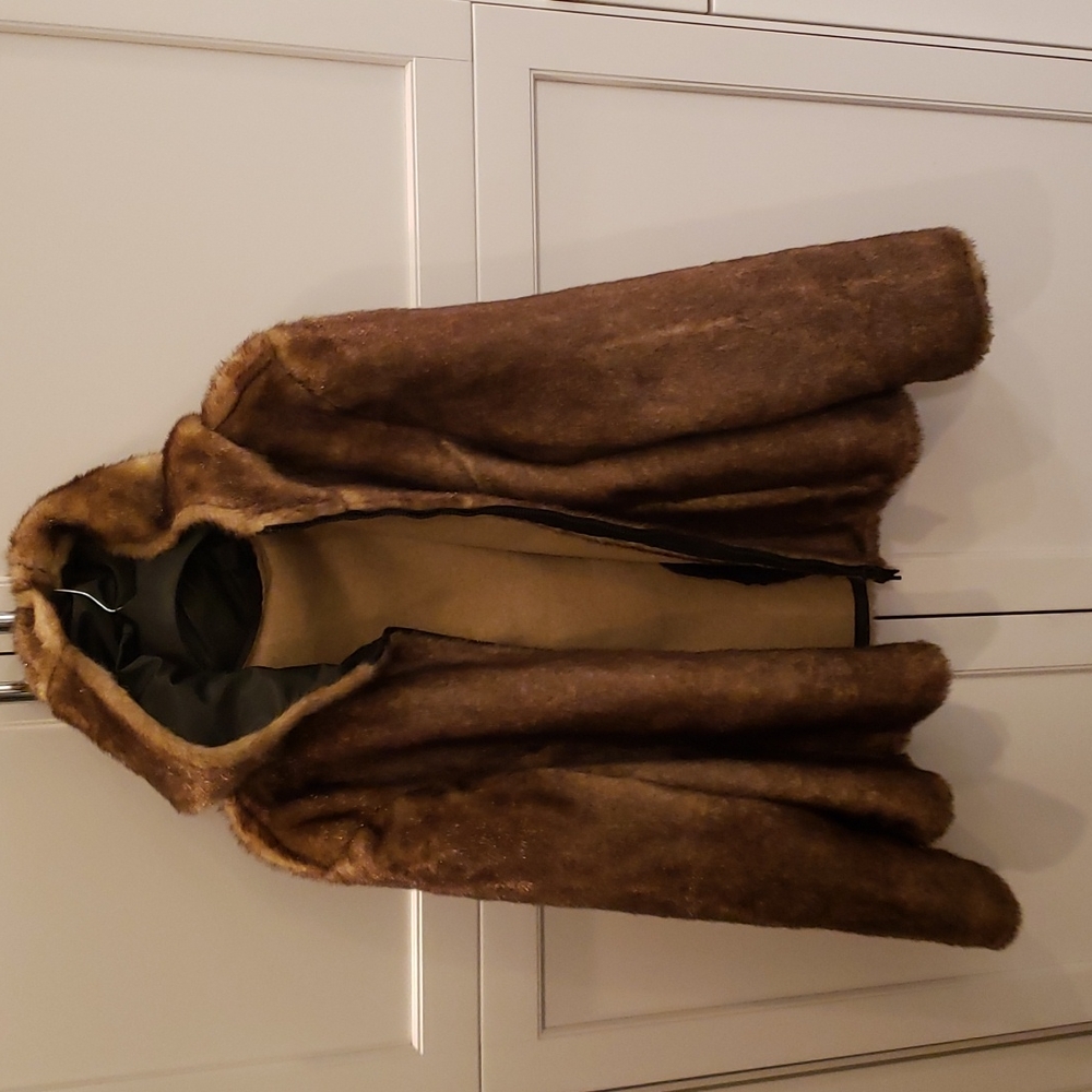 Faux fur coat with hood